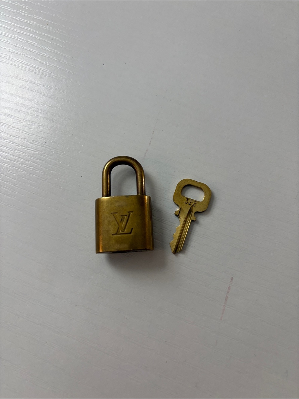 Louis Vuitton Padlock and Key in Gold Tone